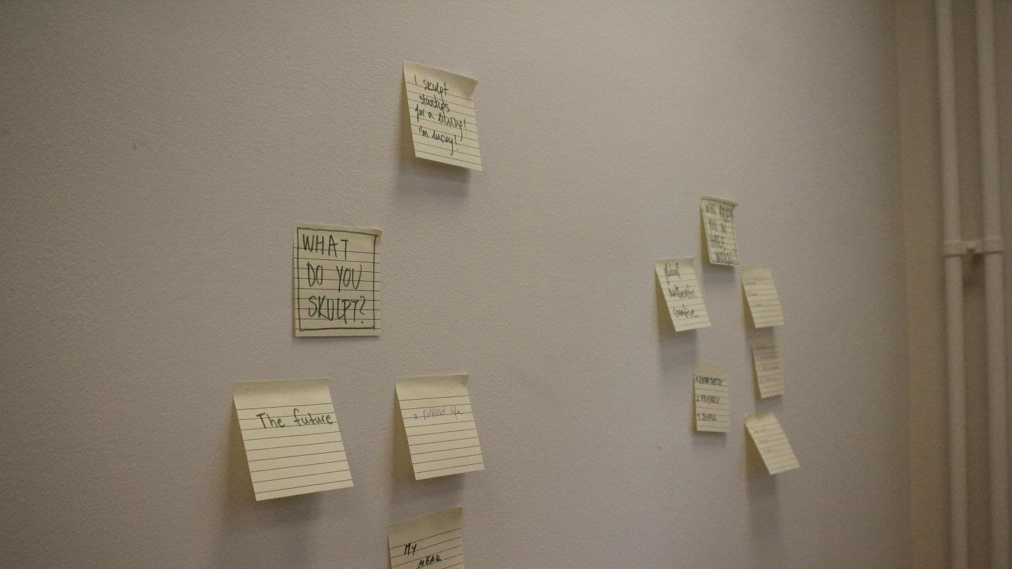 Sticky notes on a wall answering “What do you skulpt?”