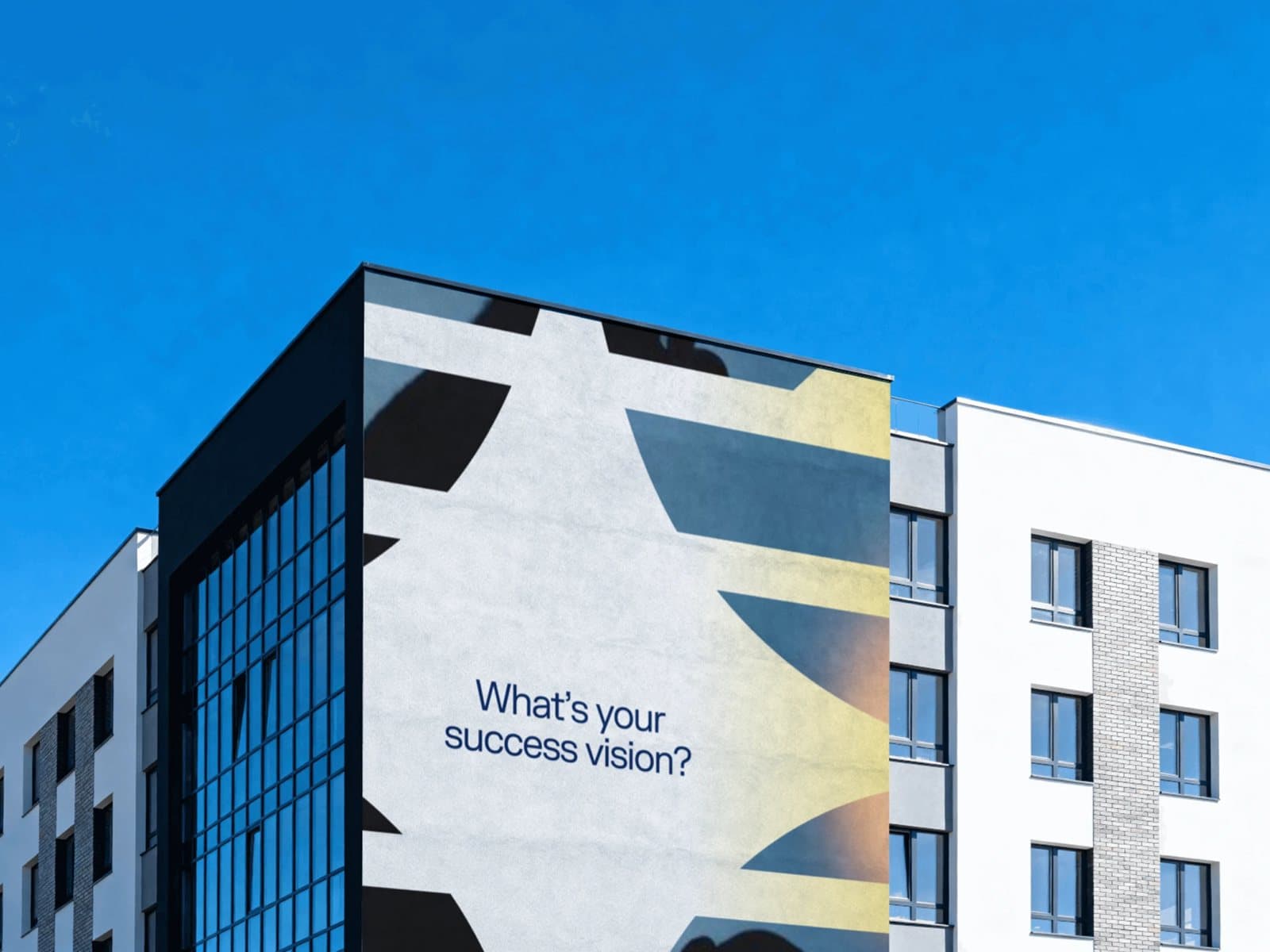 Eufolio mural on a building asking “What’s your success vision?”